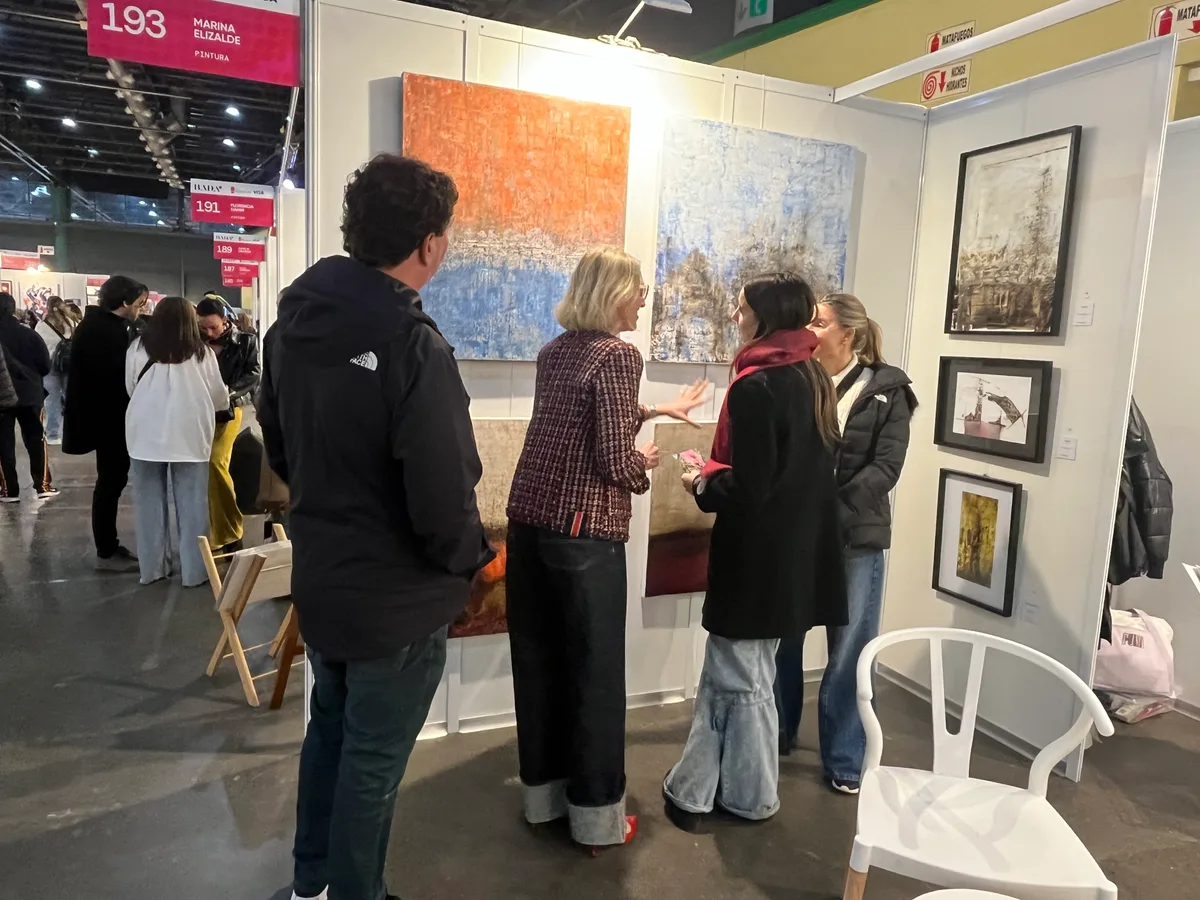 Visitors in front of the works at BADA 2024