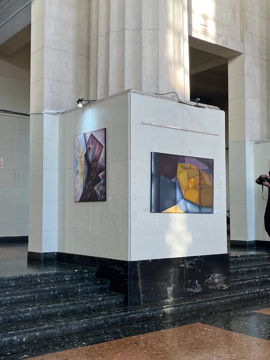 Two paintings by Marina Elizalde on a white panel