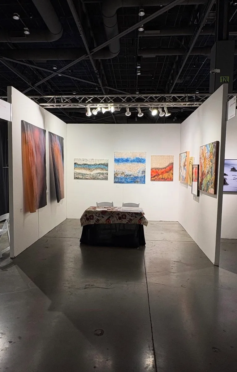 Booth with works by Marina Elizalde at the Seattle Art Fair